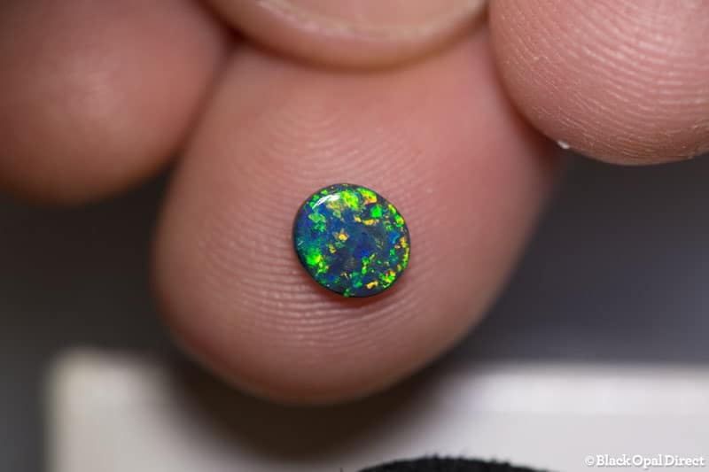 0.50 ct black opal gem 6.5x5.5x2mm