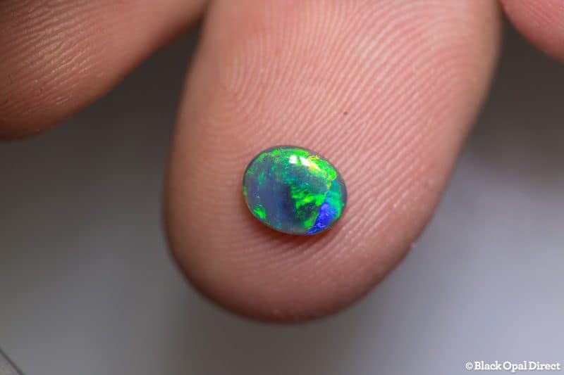 0.50 ct dark opal 7x5.5x2mm