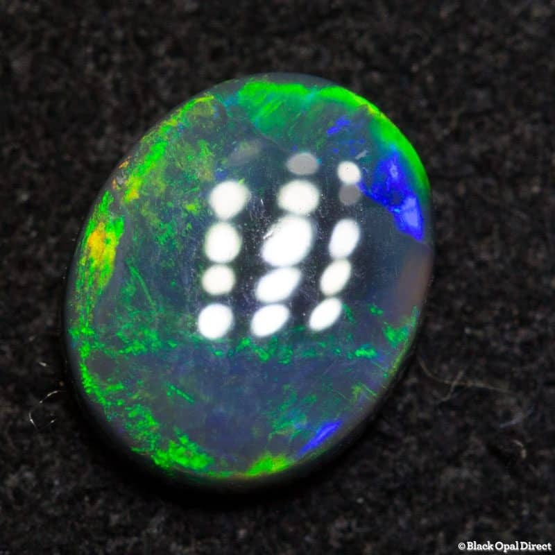 0.50 ct dark opal 7x5.5x2mm