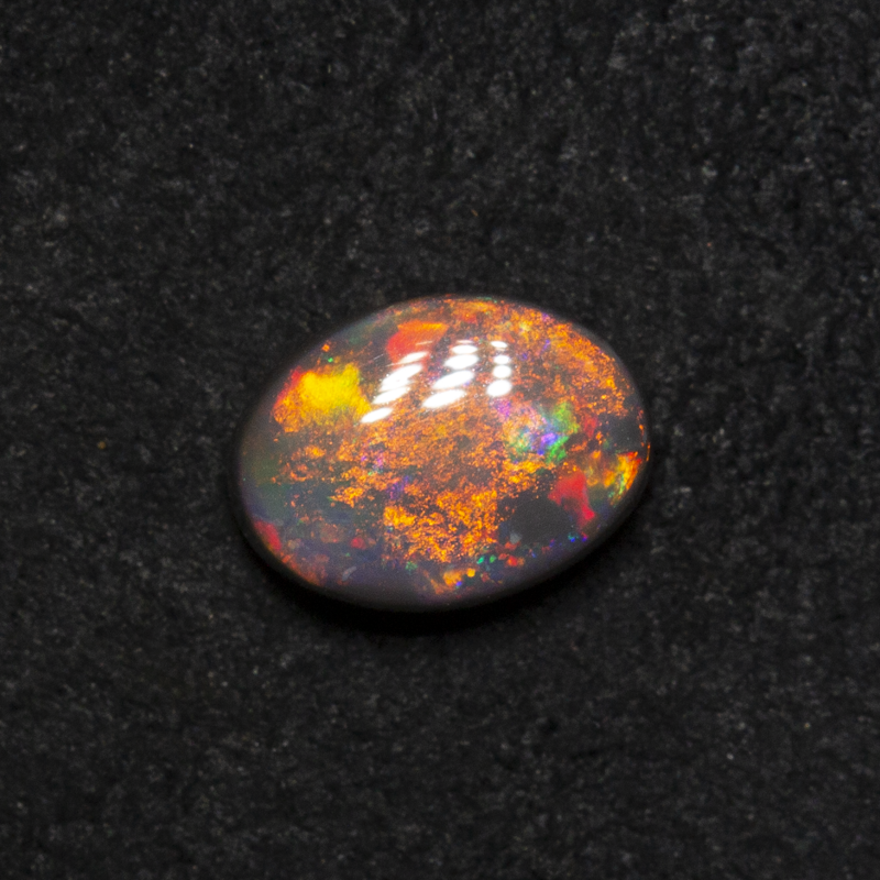 0.51 ct dark opal 6.1x4.5x2.7mm