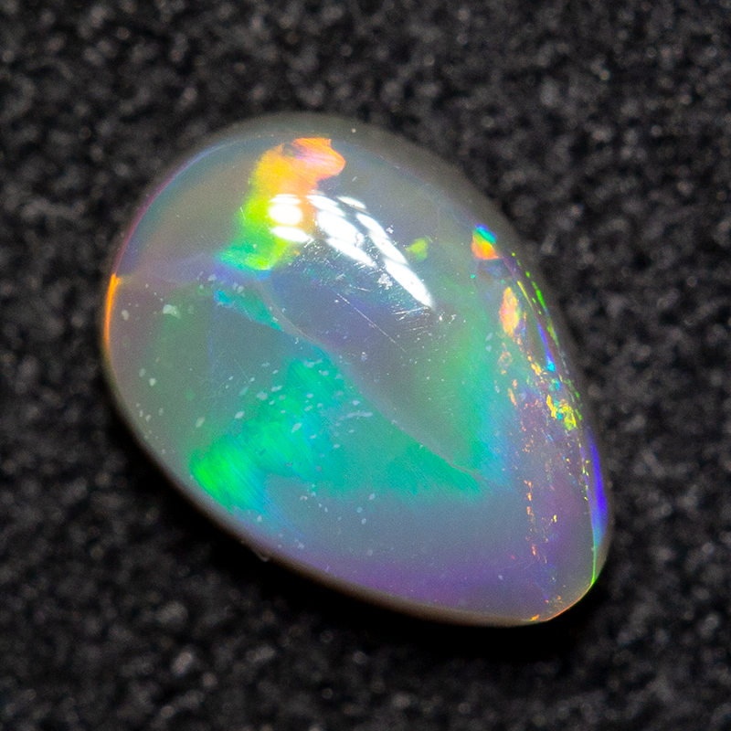 0.51 ct dark opal 6.7x4.8x2.4mm