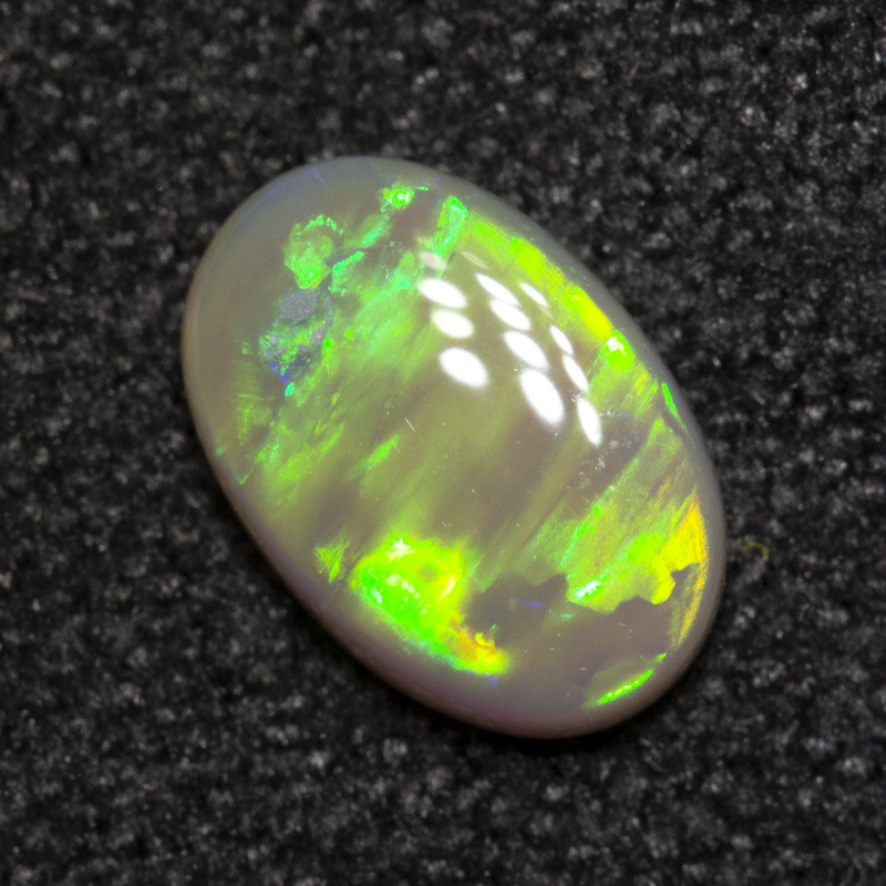 0.51 ct dark opal 7.2x4.8x2.1mm