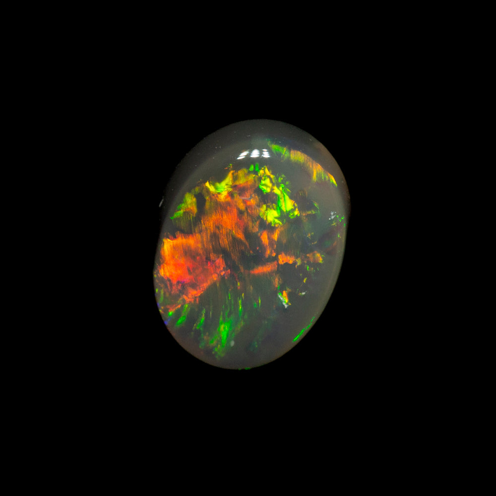 0.51 ct black opal 6.3x4.9x2.4mm