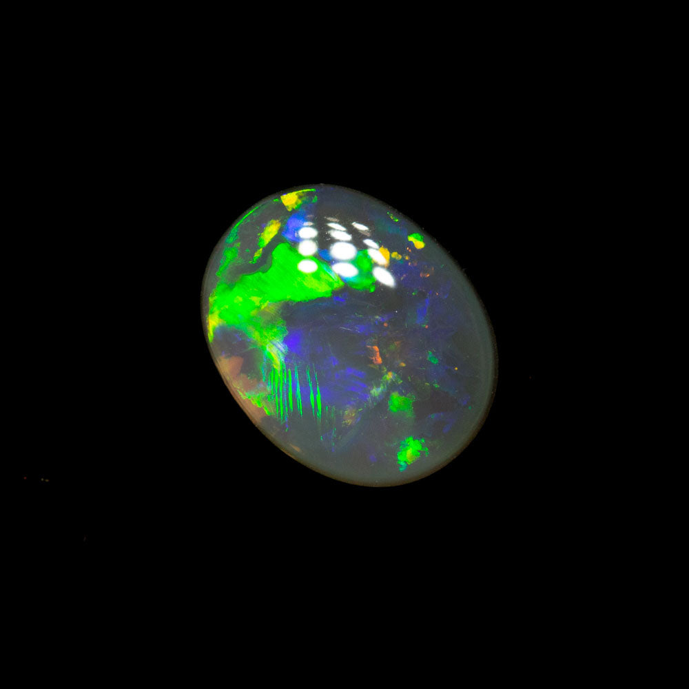 0.51 ct dark opal 7.2x5.8x1.8mm