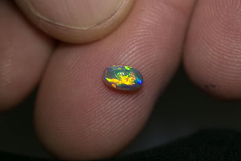 0.51 ct black crystal opal gem 6x3.5x3mm