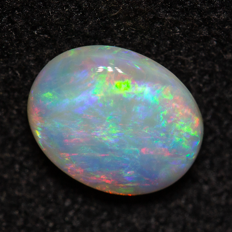0.52 ct white opal 6.5x5.1x2.4mm