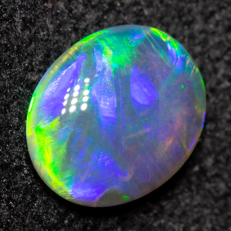 0.52 ct black crystal opal 6.3x5.3x2.5mm
