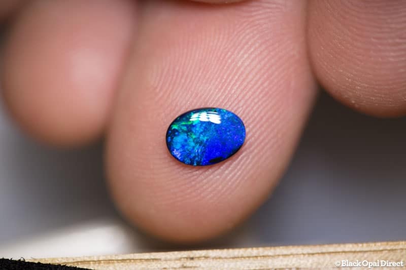 0.52 ct black opal 7.5x5.5x1.5mm
