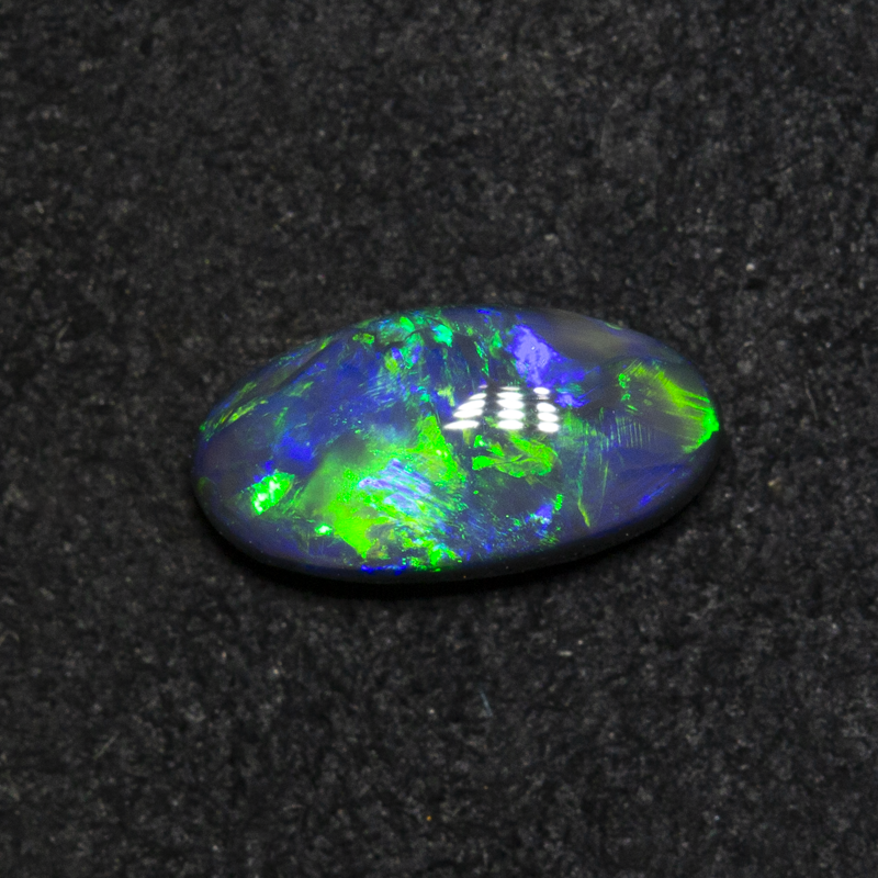 0.53 ct black opal 8x4.1x2.6mm