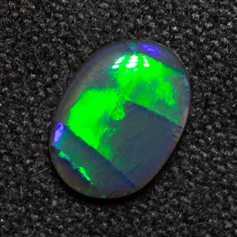 0.53 ct black opal 7.2x5.3x2mm