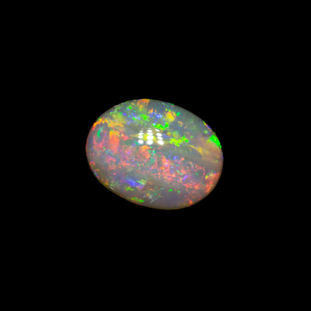 0.53 ct dark opal 6.1x4.7x2.7mm