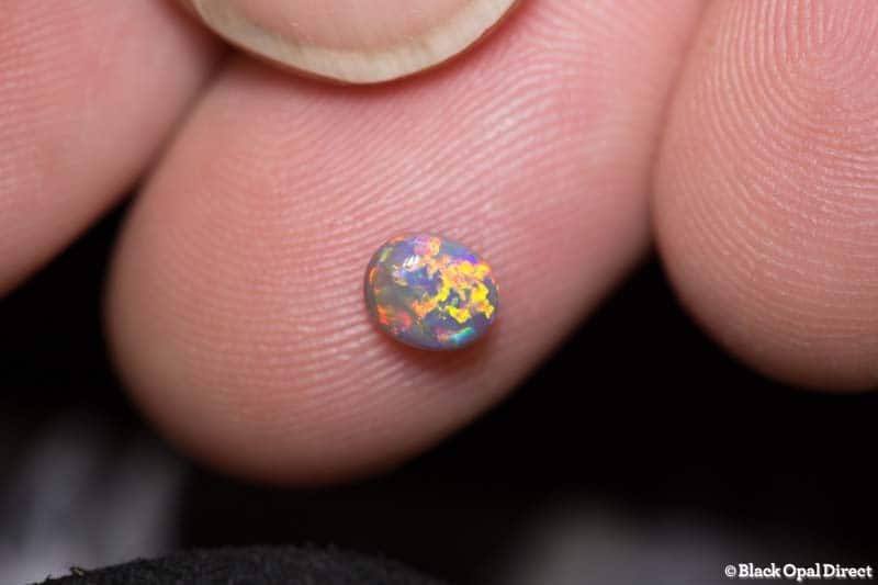 0.53 ct semi black opal 5x4.5x3mm