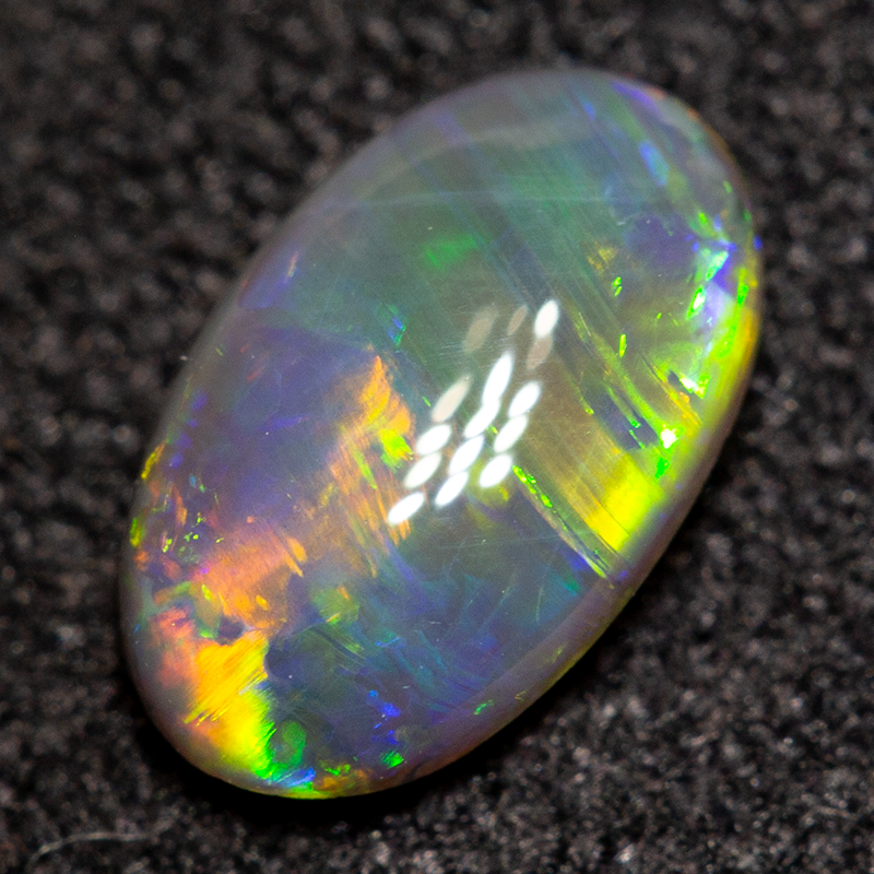 0.54 ct black opal 7.6x4.7x2.5mm