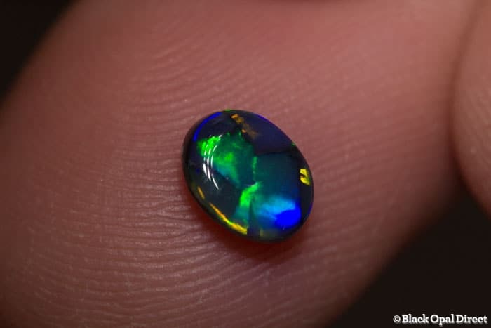 0.54 ct gem black opal 6.5x5x2.5mm