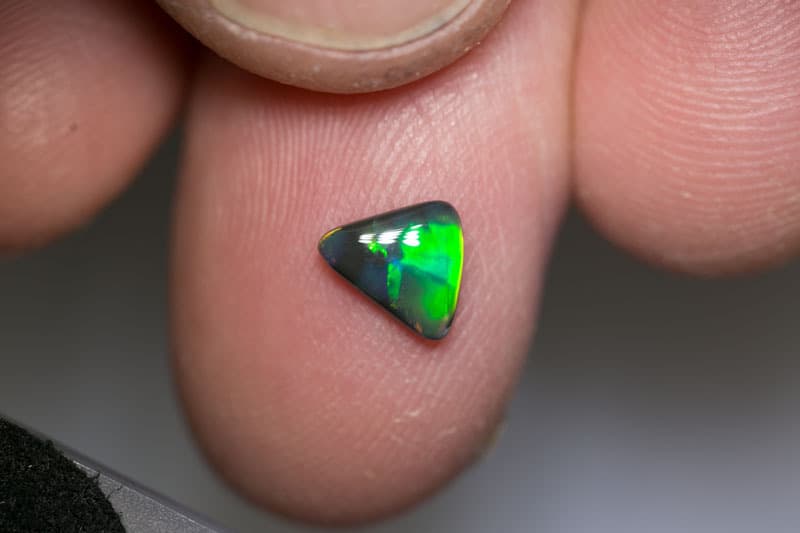 0.55 ct black opal baroque 7x6x2mm