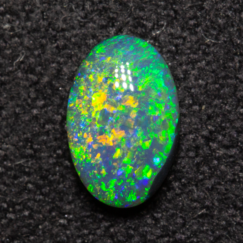 0.56 ct double-sided black opal 6.9x4.5x2.8mm