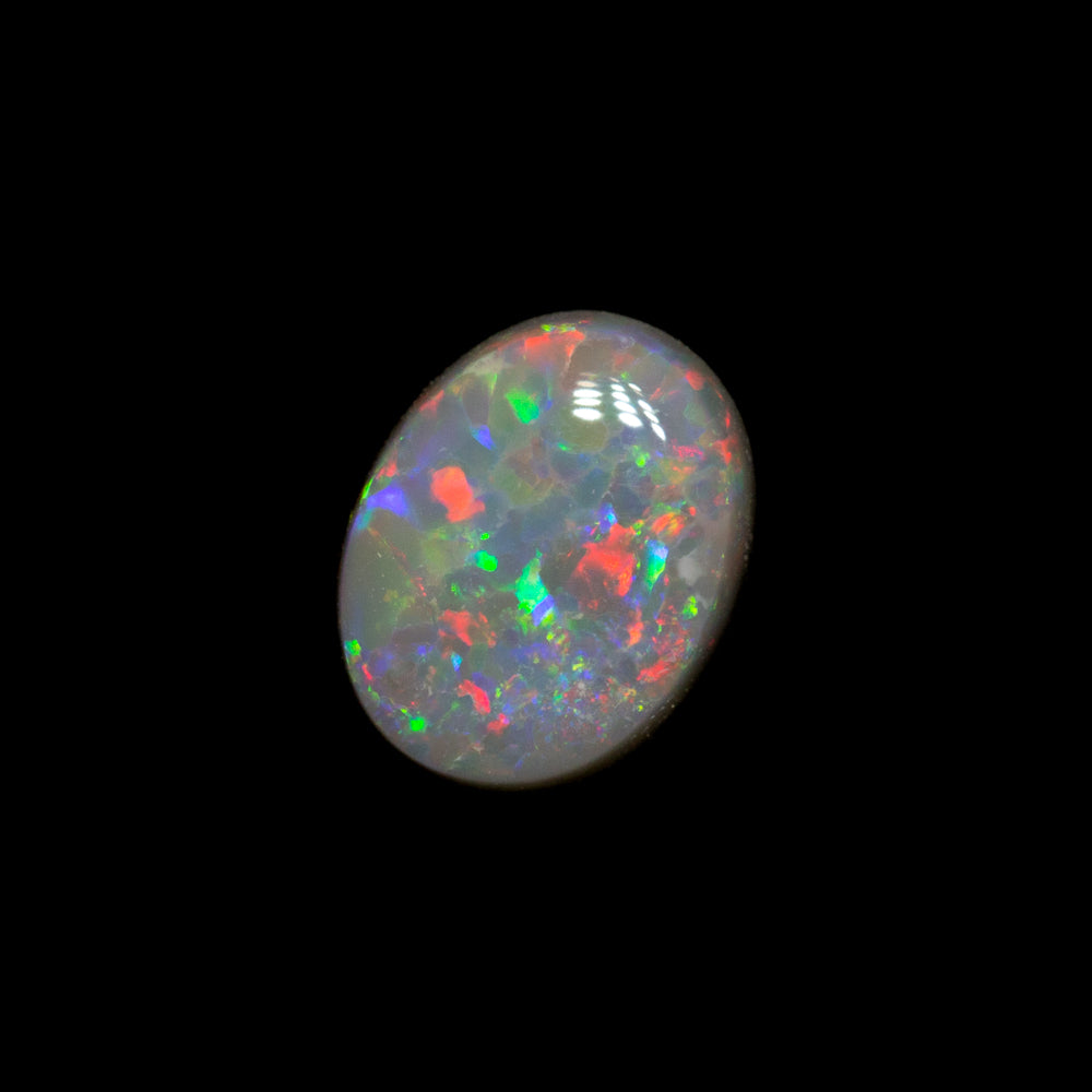 0.56 ct dark opal 6.5x5.1x2.4mm