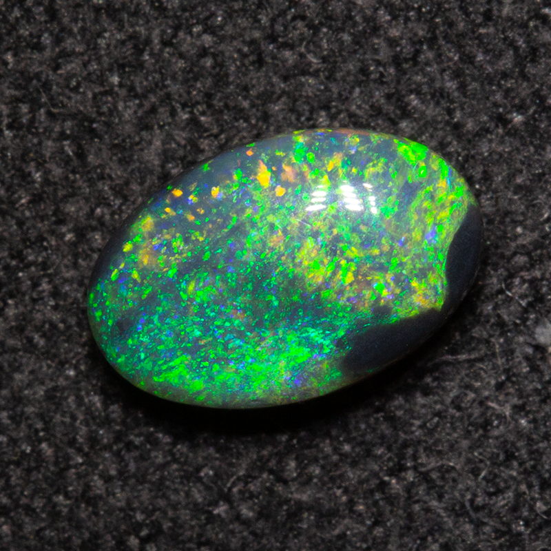 0.56 ct double-sided black opal 6.9x4.5x2.8mm