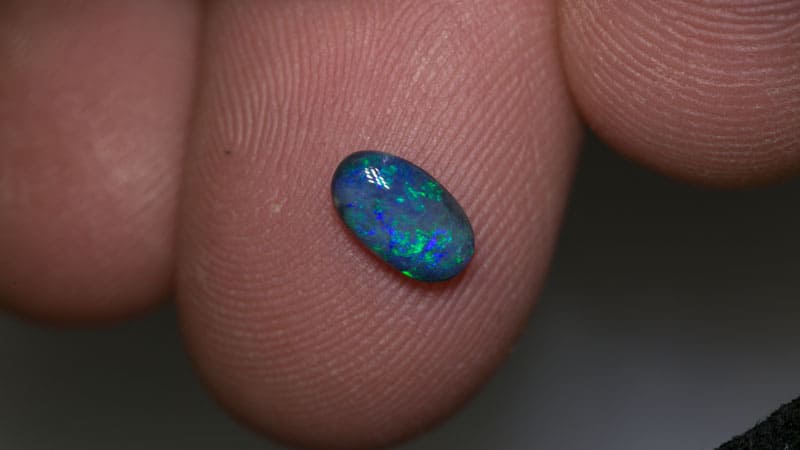 0.56 ct black opal 7.5x4x2mm