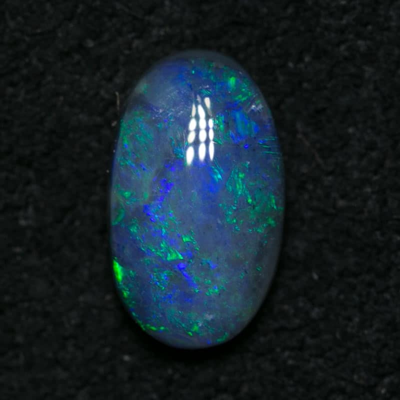 0.56 ct black opal 7.5x4x2mm