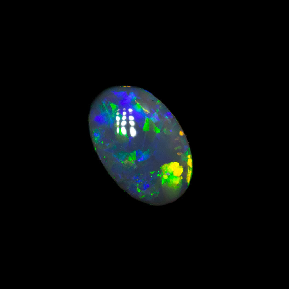 0.57 ct black opal 6.6x4.6x2.9mm