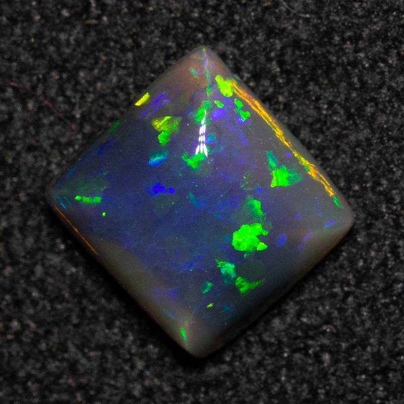 0.57 ct black opal 5.7x5.4x2.6mm