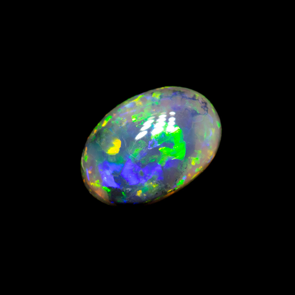 0.57 ct black opal 6.9x4.7x2.7mm