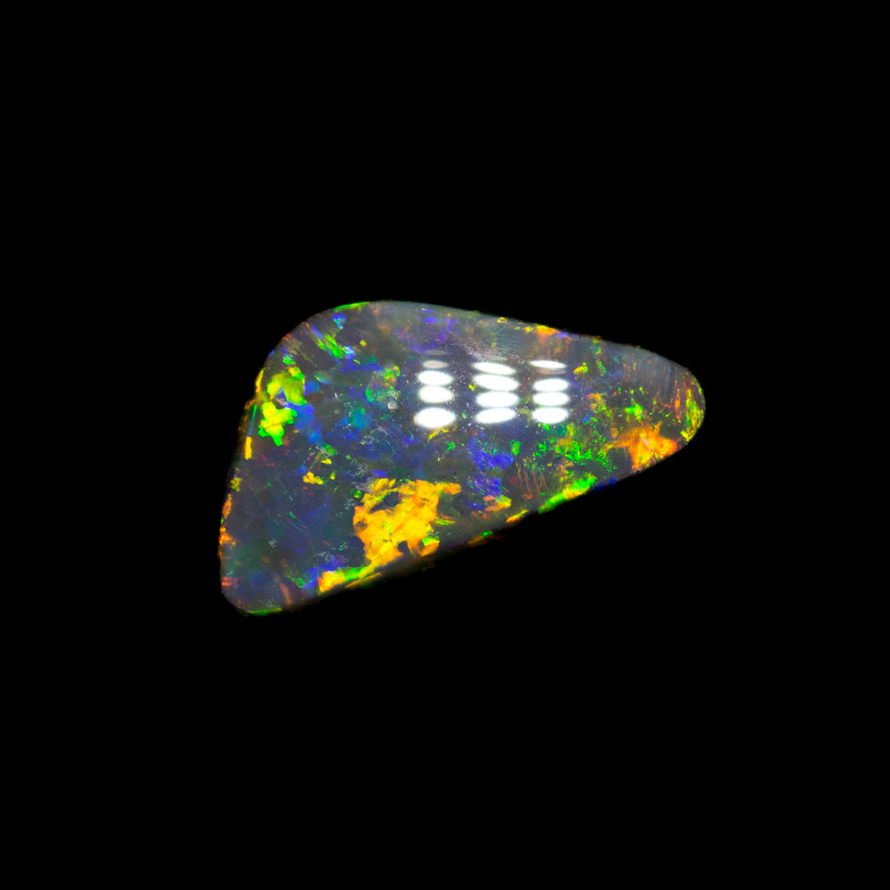 0.57 ct black opal 8.3x4.5x2.6mm