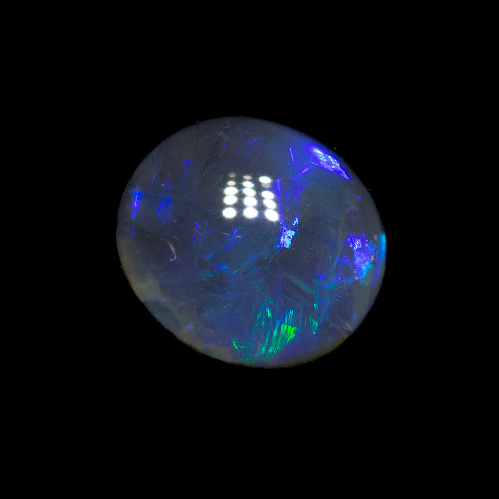 0.57 ct black opal 6x5.3x2.8mm