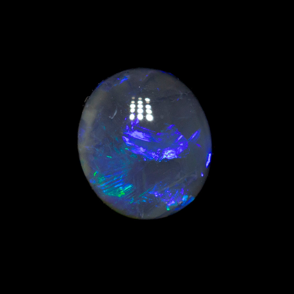 0.57 ct black opal 6x5.3x2.8mm