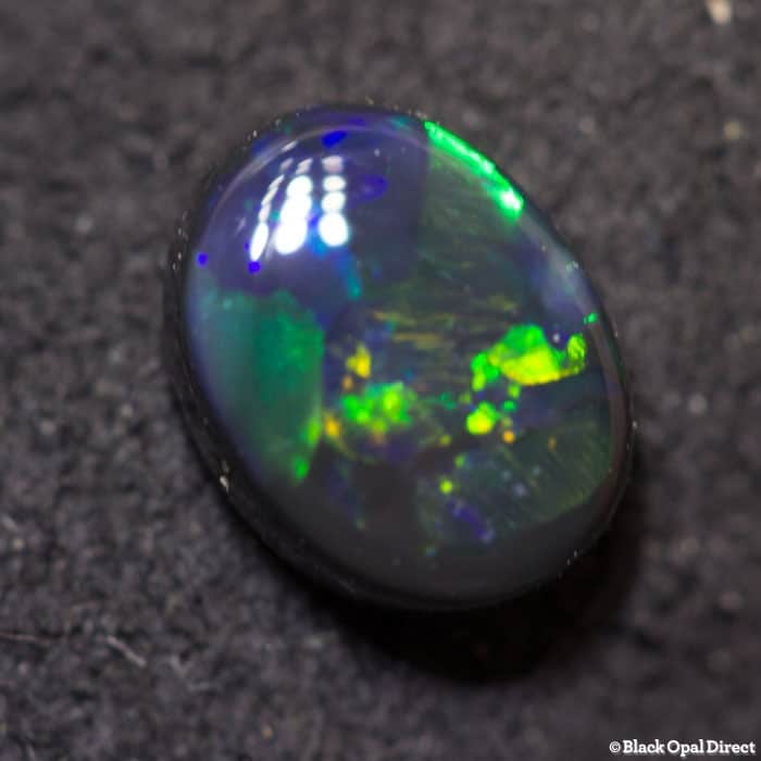 0.57 ct black opal 6x4.5x2mm