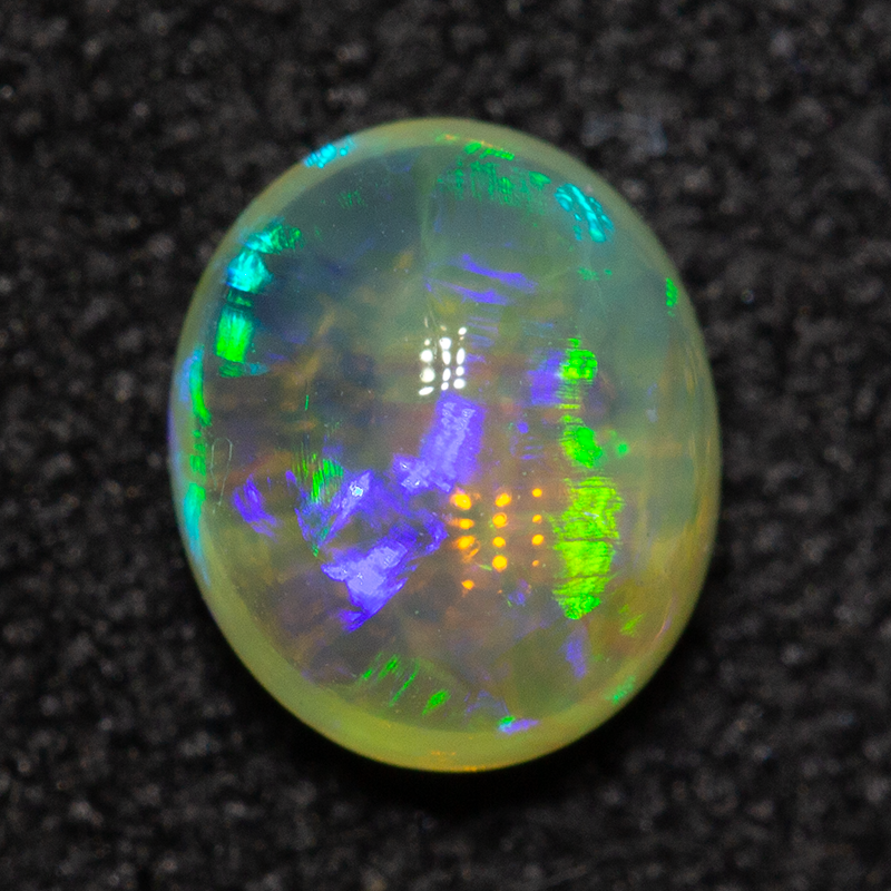 0.58 ct crystal opal 5.8x4.8x3.5mm