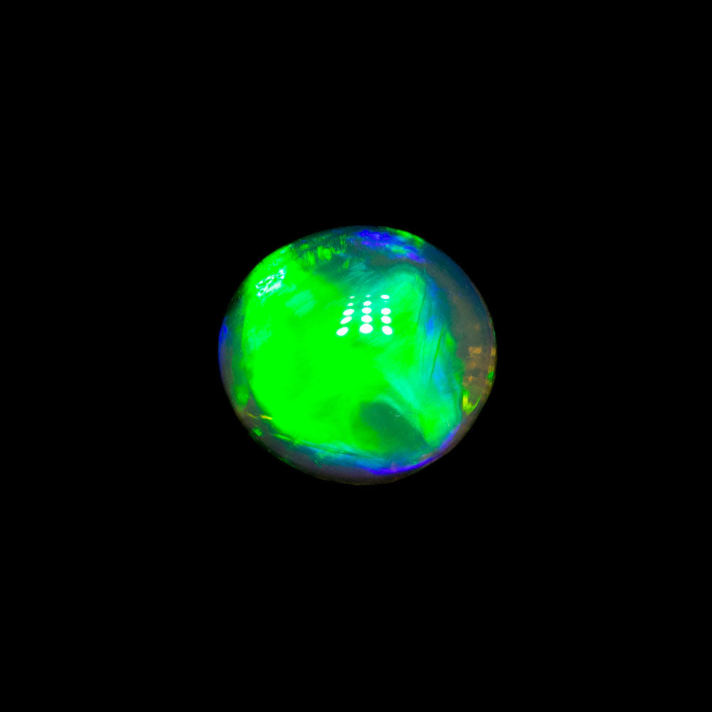 0.58 ct gem black opal 6.1x5.7x2.8mm