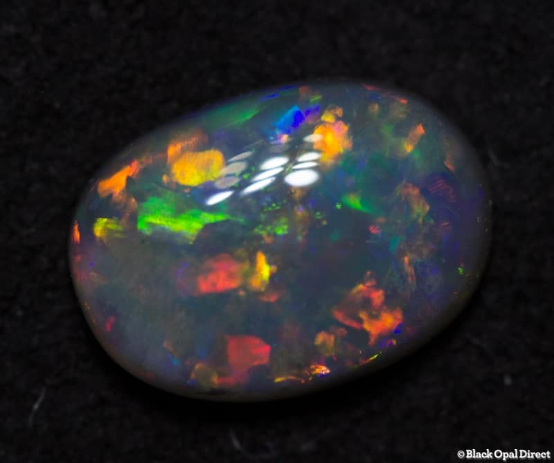 0.58 ct semi black opal 7x5x2mm