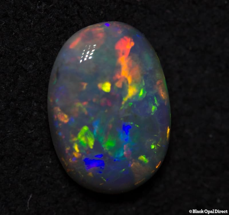 0.58 ct semi black opal 7x5x2mm