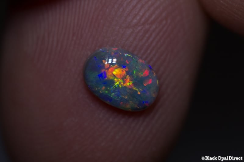 0.58 ct semi black opal 7x5x2mm