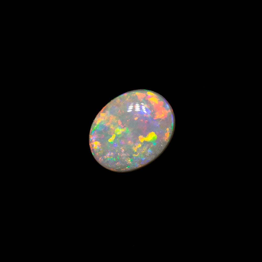 0.59 ct white opal 6.4x5.1x2.6mm
