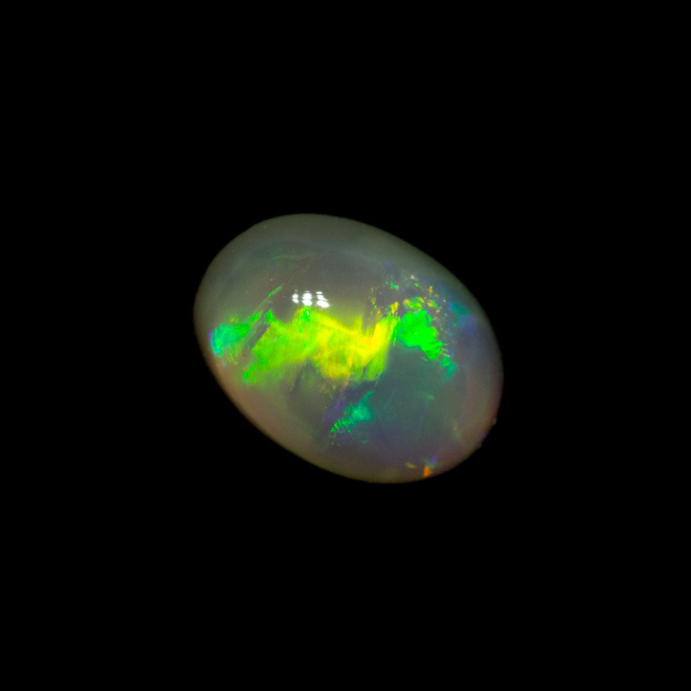 0.59 ct dark opal 6.1x4.4x3.4mm