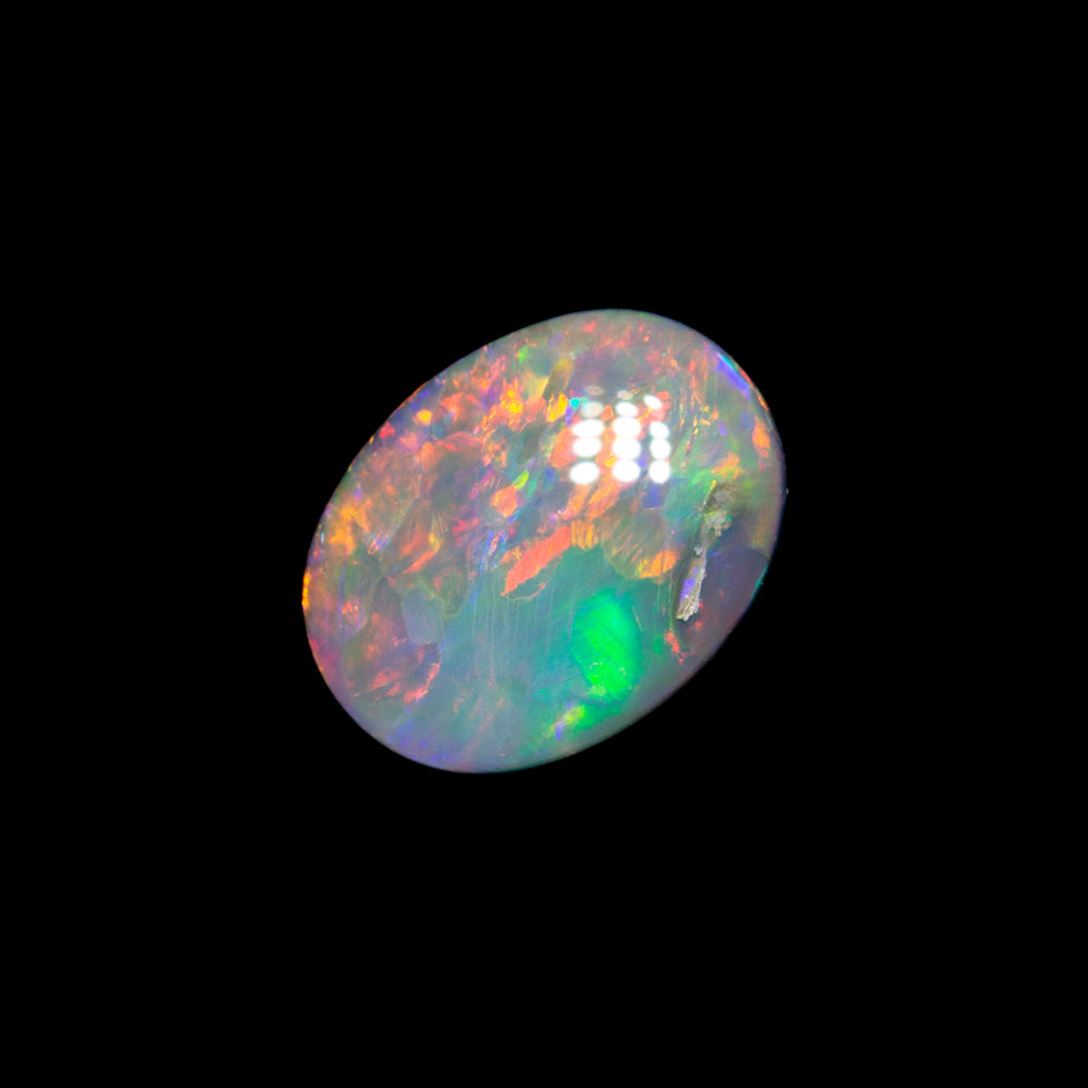 0.59 ct dark opal 6.9x5.3x2.5mm