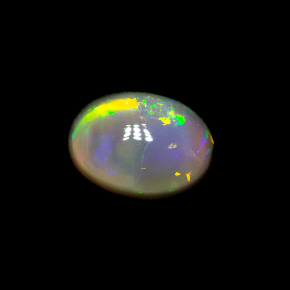 0.59 ct dark opal 6.1x4.4x3.4mm