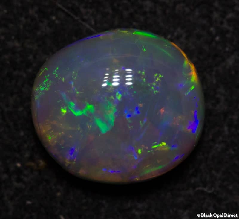 0.60 ct semi black opal 6x5x3mm