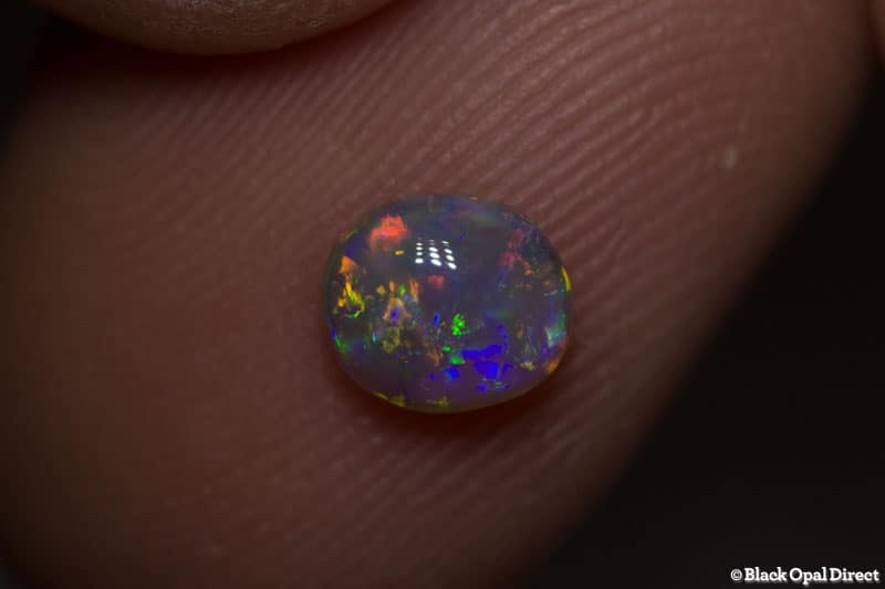 0.60 ct semi black opal 6x5x3mm