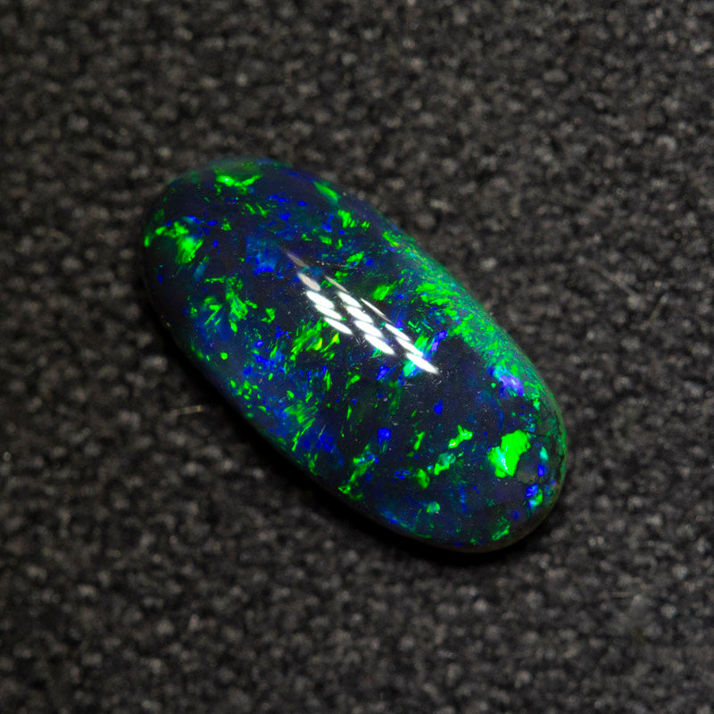 0.61 ct black opal 8.6x4.2x2.6mm