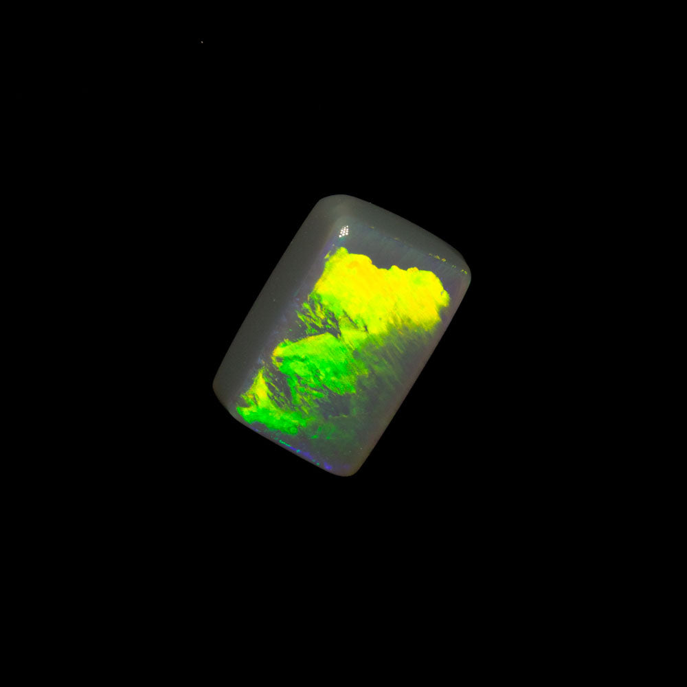 0.61 ct dark opal 6.3x4.3x2.6mm