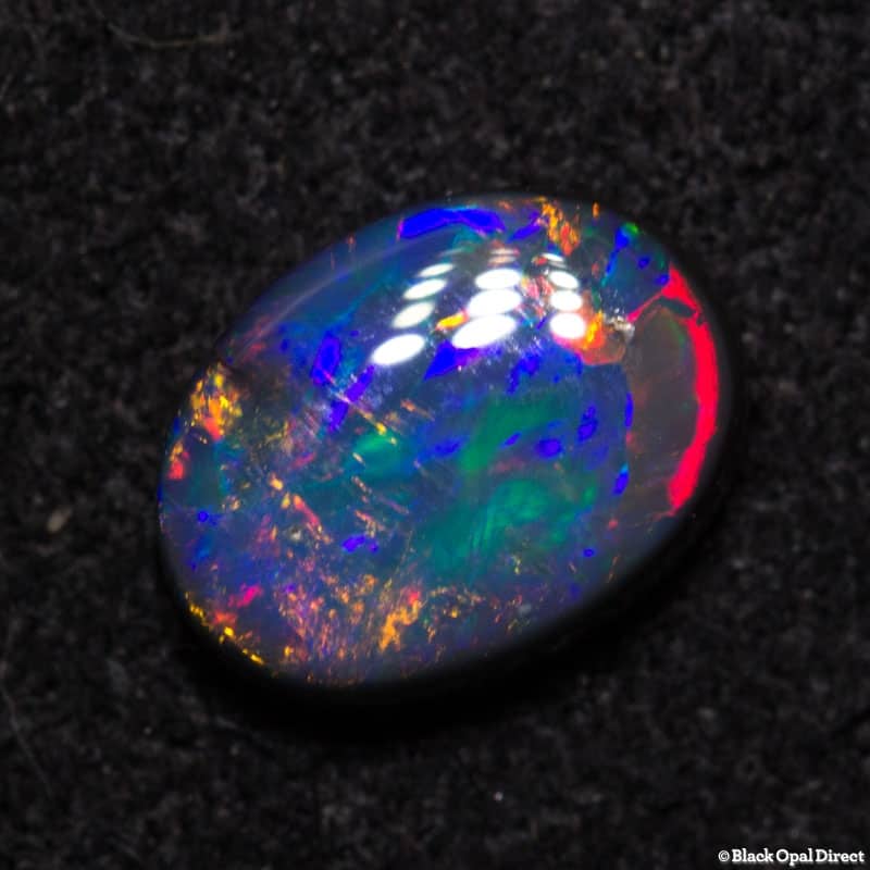 0.61 ct black opal gem 7x5x2.2mm