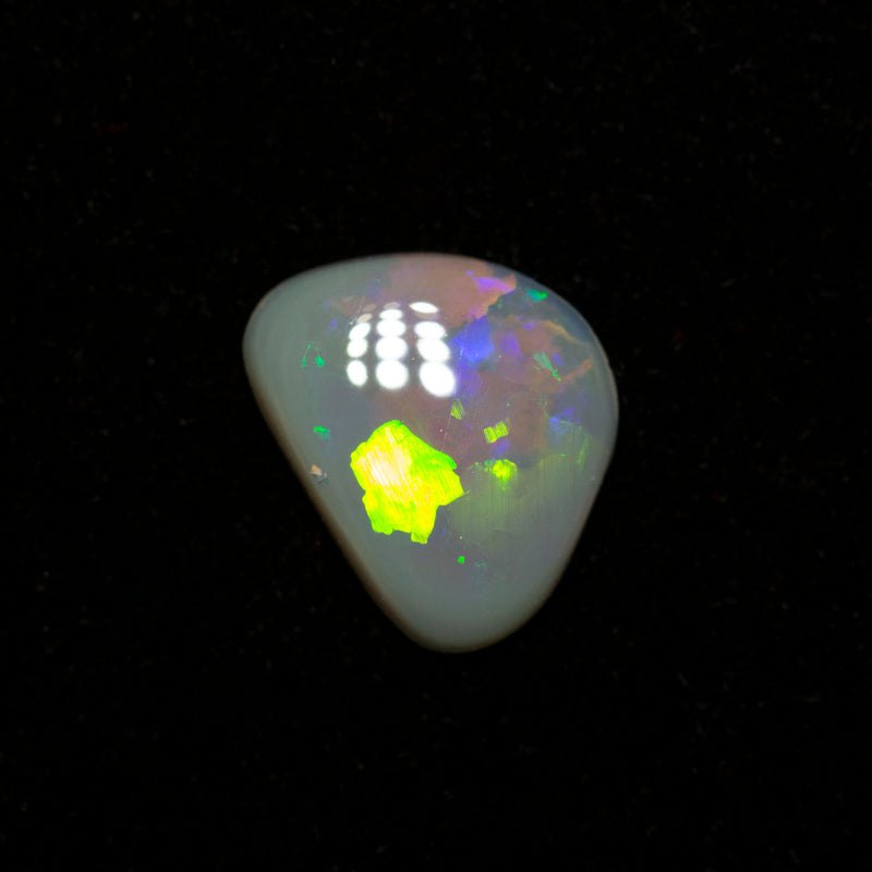 0.62 ct dark opal 8.4x6.6x1.8mm