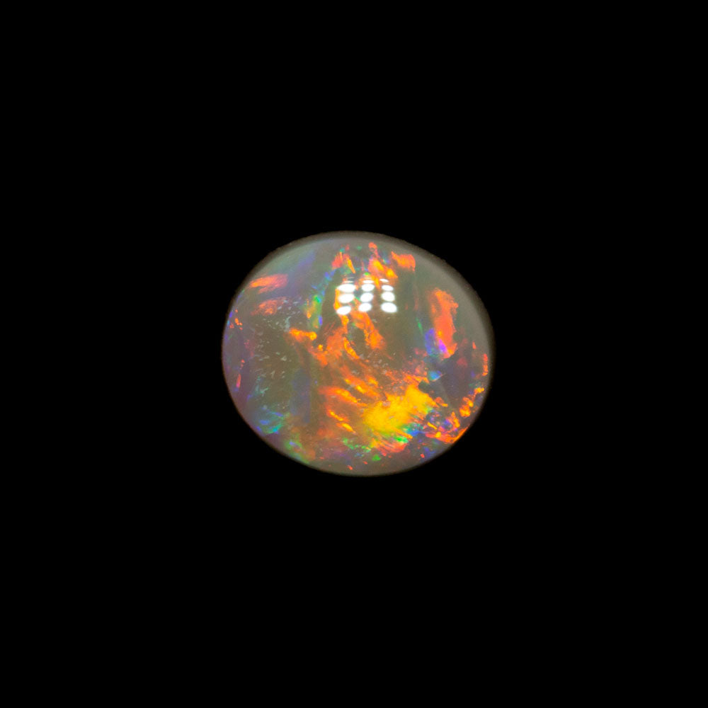 0.62 ct dark opal 5.9x5.1x3mm