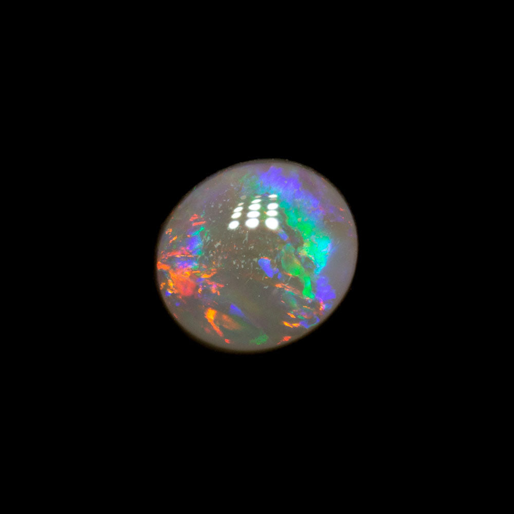 0.62 ct dark opal 5.9x5.1x3mm