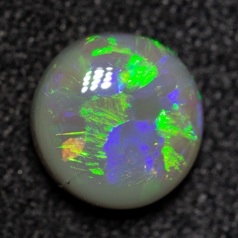 0.63 ct dark opal 6x6x3mm