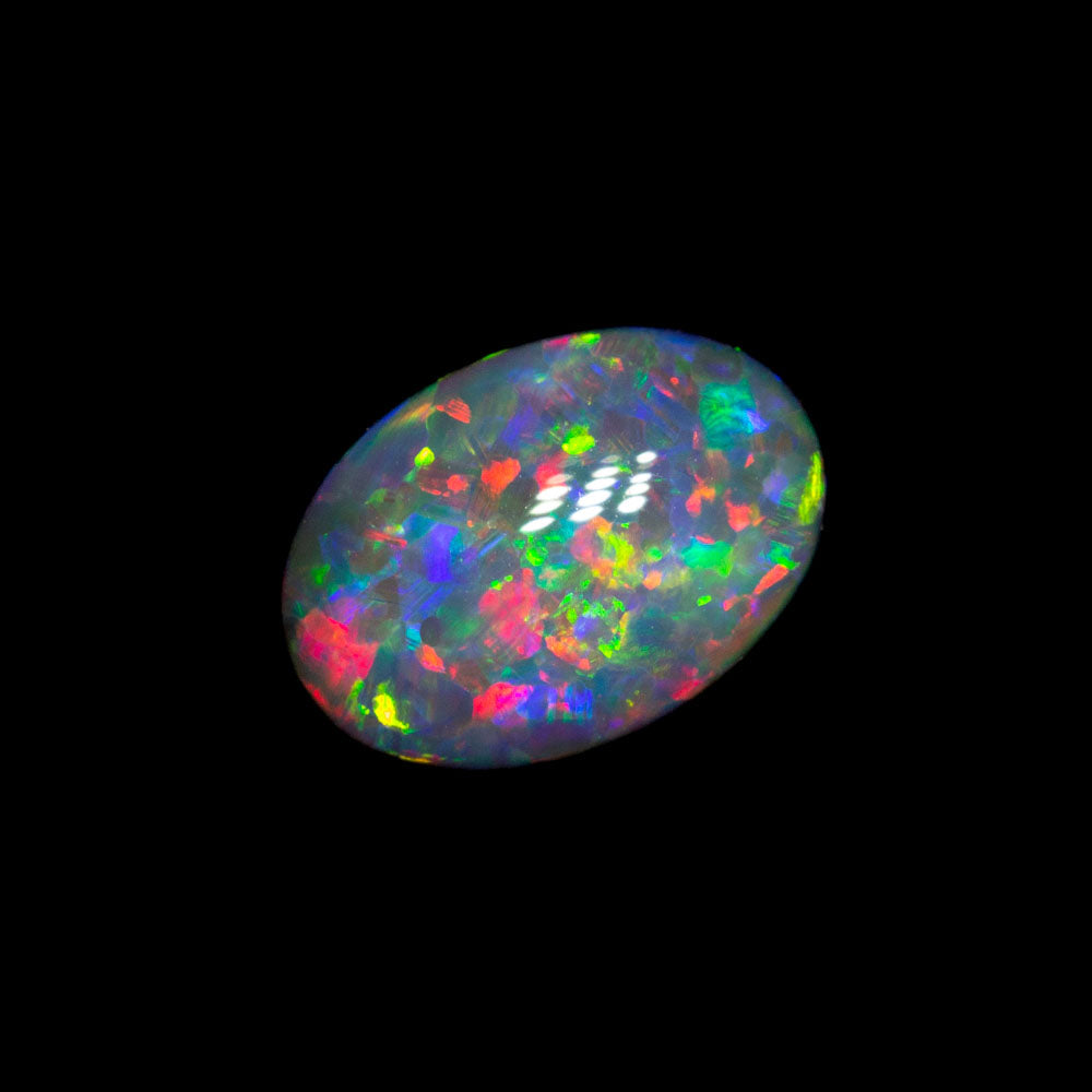 0.63 ct dark opal 6.9x4.9x2.9mm